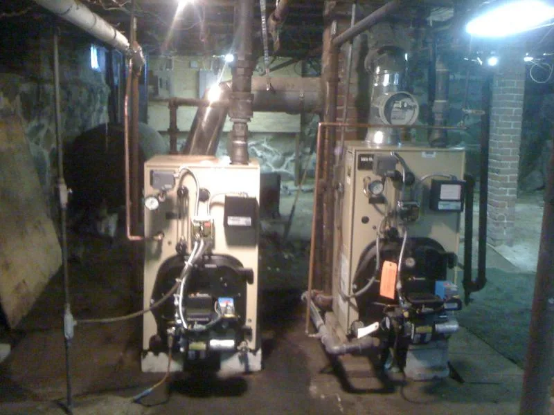 Twin residential boiler installation in a South Shore basement